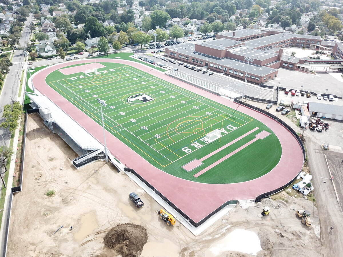 Completed synthetic turf field and running track